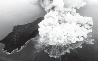  ??  ?? An aerial view of Anak Krakatau volcano during an eruption at Sunda strait in South Lampung, Indonesia, December 23, 2018 in this photo taken by Antara Foto. Antara Foto/Bisnis Indonesia/Nurul Hidayat/ via REUTERS