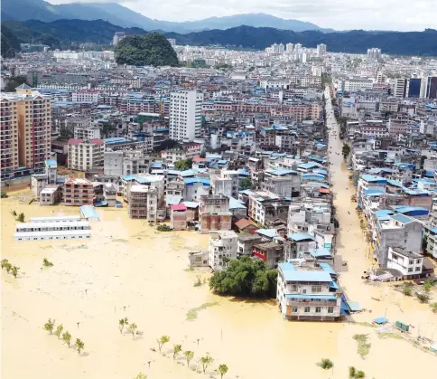  ??  ?? A general view of a flooded area in Liuzhou, Guangxi province. — Reuters photo