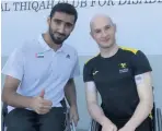  ??  ?? ●»Olympic Bronze medallist Andy Small (T33 100m) with Olympic Gold (T34 800m) medallist Mohamed Hammadi of the United Arab Emirates