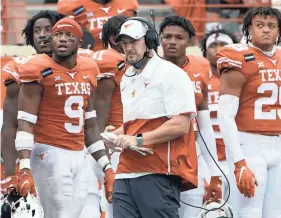  ?? ERIC GAY/AP ?? Texas coach Tom Herman looks on during the Longhorns’ loss to Iowa State on Friday. The loss knocked Texas out of league title contention.