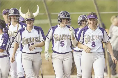  ?? Chris Torres/ The Signal ?? Valencia outfielder Blair Rune (5) celebrates with her teammates after hitting a home run during Thursday’s Foothill League matchup against Canyon at Valencia High School.