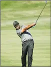  ?? (AP) ?? Internatio­nal Team member Anirban Lahiri hits on the fourth fairway during the final round of the Presidents Cup golf tournament at Liberty National Golf Club in Jersey
City, NJ, on Oct 1.