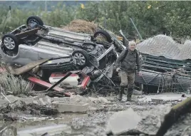  ?? Picture: EPA-EFE ?? DEVASTATED. A man assesses the damage following typhoon Hagibis in Nagano, Japan, yesterday. According to media reports, at least 40 people died after the typhoon made landfall in Japan.