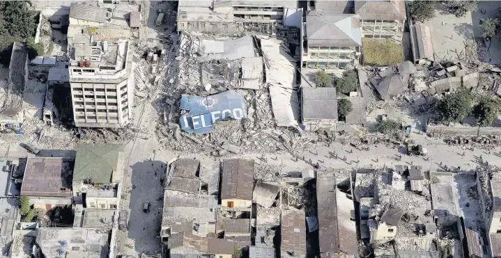  ?? Logan Abassi ?? > January 2010: The ruins of downtown Port au Prince, Haiti, after the 7.0-magnitude earthquake struck