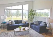  ?? ANDREW PENNER ?? The Fisher show home at Wildstone features a bright and open floor plan with a spacious living room and great views.