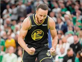  ?? Karl Mondon / TNS ?? Stephen Curry’s 43 points in Game 4 in Boston helped the Warriors even the series with the Celtics at 2 with Game 5 on Monday in San Francisco.