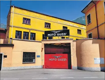  ?? Charles Fleming For The Times ?? THE MOTO GUZZI factory in Mandello del Lario, Italy. The company, founded by two World War I pilots and their mechanic, endured decades of ownership changes before being absorbed into the Piaggio Group in 2004.