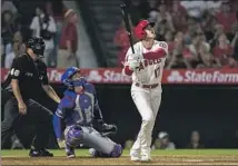  ?? Alex Gallardo Associated Press ?? SHOHEI OHTANI f lies out in the eighth inning but earned his sixth straight start with double-digit strikeouts on the mound.