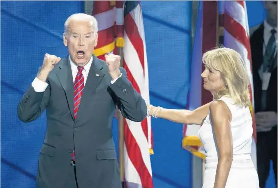  ?? Marcus Yam Los Angeles Times ?? VICE PRESIDENT Joe Biden with wife Jill. Speaking of Donald Trump, he said no nominee has “known less or been less prepared to deal with our national security.”