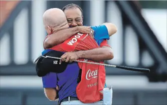  ?? SAM GREENWOOD GETTY IMAGES ?? After four back surgeries, few thought Tiger Woods could achieve a victory. Even he had said he would be OK with that. Above, Woods, back, and caddie Joe LaCava celebrate Sunday after winning the Tour Championsh­ip.