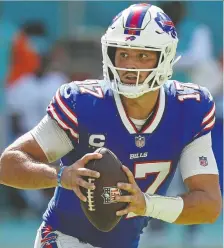  ?? ERIC ESPADA/GETTY IMAGES ?? Quarterbac­k Josh Allen of the Buffalo Bills is looking to avenge last week's loss against Miami. Baltimore has allowed 64 points in its last two games.