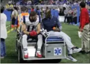  ?? DUANE BURLESON — THE ASSOCIATED PRESS ?? Patriots wide receiver Julian Edelman (11) is taken off the field on a cart on Friday.