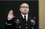  ?? ANDREW HARNIK — THE ASSOCIATED PRESS FILE ?? On Nov. 19, 2019, National Security Council aide Lt. Col. Alexander Vindman is sworn in to testify before the House Intelligen­ce Committee on Capitol Hill in Washington.