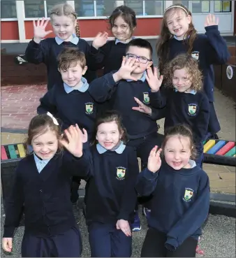  ??  ?? Happy smiles from Senior Infants at Derinagree National School on Monday morning.
