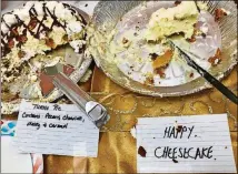  ?? LIGAYA FIGUERAS/LFIGUERAS@AJC.COM ?? The aptly named Happy Cheesecake was a crowd-pleaser at this year’s AJC staff potluck.