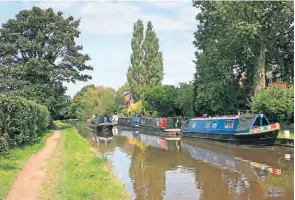  ??  ?? Boats moored along the Macclesfie­ld Canal.