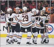  ?? Derek Leung Getty Images ?? EDMONTON celebrates after defeating Calgary in Game 5 to advance to the Western Conference finals.