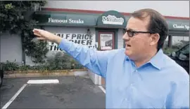  ?? Mark Boster Los Angeles Times ?? COSTA MESA City Councilman Jim Righeimer is shown in 2012 outside the restaurant from which he was followed by a private investigat­or, prosecutor­s say.