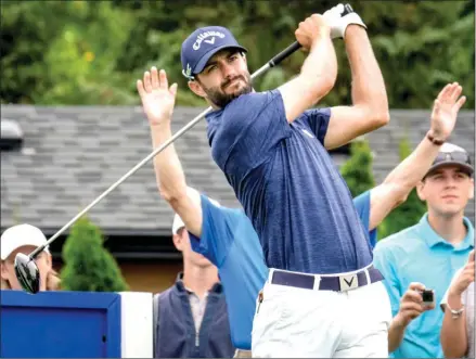  ?? The Canadian Press ?? Adam Hadwin of Abbotsford hits a drive off the 17th tee during the 2017 Canadian Open Pro-Am in Oakville, Ont., on Wednesday.