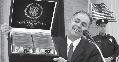  ??  ?? U.S. RESIDENTS GET 20 STATE SILVER 100’S FREE: Pictured above is the never before seen entire 50 State Silver 100’s Collection ™ shown off by officials from the Federated Mint that everyone is trying to get. Lucky U.S. residents who are among the first...