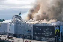  ?? RITZAU SCANPIX PHOTO VIA AFP ?? DANISH DISASTER
Plumes of smoke rise from the burning Boersen building in Denmark’s capital Copenhagen on Tuesday, April 16, 2024.