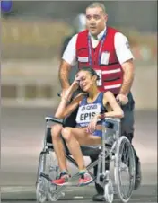  ?? REUTERS ?? ■ Italy's Giovanna Epis being taken away in a wheelchair.