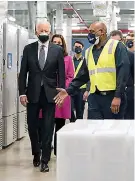  ?? AP Photo/Evan Vucci ?? President Joe Biden tours a Pfizer manufactur­ing site Friday in Portage, Mich.