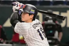  ?? Eugene Hoshiko/Associated Press ?? Shohei Ohtani is Japan’s biggest baseball export with his popularity surpassing that of national heroes Ichiro Suzuki and Hideo Nomo.