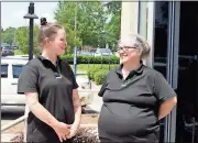  ?? Doug Walker / Rome News-Tribune ?? Rachel Hight (left), now 21, chats with her mother Patricia Hight outside the Subway at Redmond Regional Medical Center where they were on break. Rachel has had more surgeries at the Shriners burn hospital in Cincinnati than she can remember over the...