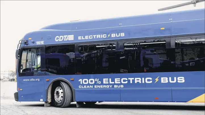  ?? Will Waldron / Times Union ?? The Capital District Transporta­tion Department rolled out its four new electric buses Jan. 10 in Albany. The buses eliminate between 85 and 175 tons of greenhouse gas emissions annually.