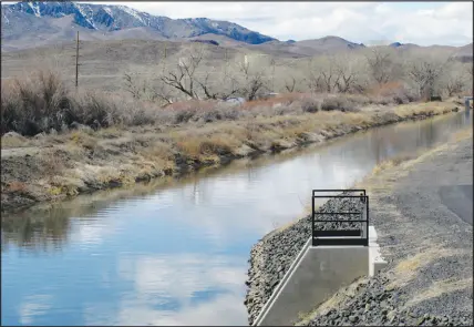  ?? SCOTT SONNER / ASSOCIATED PRESS FILE (2021) ?? Water flows through the Truckee canal in Fernley. The city has a planned project to take surface water from the canal and pipe it to its water treatment plant.