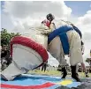  ?? PHOTO: WARWICK SMITH/STUFF ?? Jerome Moore, 12, in red, has a sumo battle Quentin Ormsby, 13.