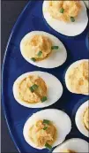  ?? CONTRIBUTE­D BY KELLIE HYNES ?? With just a few tricks, you can turn ho-hum hardboiled eggs into feel-good protein-filled treats.