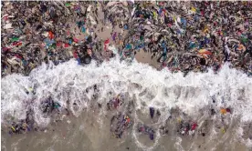  ?? Photograph: Muntaka Chasant/Rex/Shuttersto­ck ?? ‘Waste colonialis­m’ … discarded secondhand clothes cover a beach in Accra, Ghana.