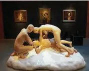  ??  ?? A sculpture by artist Lu Zhengyuan and paintings by Arturo Rivera are part of Christie’s art collection.