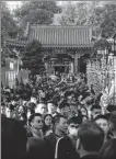  ?? MICHAEL RHYS CARD / CHINA DAILY ?? Crowds of visitors at Wong Tai Sin temple during the recent Spring Festival.