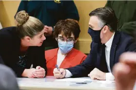  ?? Amy Beth Bennett / Associated Press ?? Nikolas Cruz consults with his attorneys at the Broward County Courthouse in Fort Lauderdale, Fla. He has pleaded guilty to 17 counts of first-degree murder.