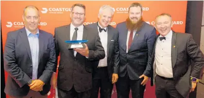 ?? ?? Hutchwilco sales and marketing manager Tim Ritchie (from left) presents awards to Taupō Coastguard members Mark Hughes, Mike Fletcher and Jeff Benson and Coastguard CEO Callum Gillespie.