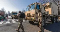  ?? AP ?? Members of the District of Columbia National Guard secure the perimeter around the U.S. Capitol on Jan. 13, 2021.