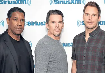  ??  ?? Three out of seven ain’t bad: Denzel with Ethan Hawke and Chris Pratt.