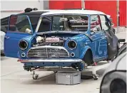  ??  ?? CLASSIC Mini Remastered sees new, deseamed bodyshell fitted on to an original Mini chassis