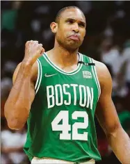  ?? Lynne Sladky / Associated Press ?? Celtics center Al Horford gestures after scoring during the second half of Game 2 of the Eastern Conference Finals against the Heat on Thursday in Miami.
