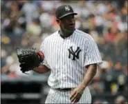  ?? JULIE JACOBSON — ASSOCIATED PRESS ?? Yankees pitcher Luis Severino heads to the dugout after being pulled in the fifth inning of Saturday’s opening game of a doublehead­er at Yankee Stadium in New York.