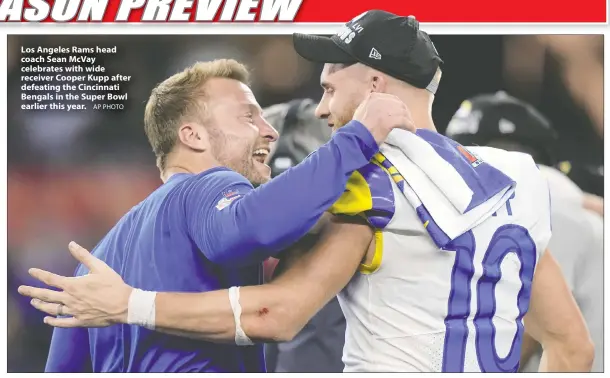  ?? AP PHOTO ?? Los Angeles Rams head coach Sean McVay celebrates with wide receiver Cooper Kupp after defeating the Cincinnati Bengals in the Super Bowl earlier this year.