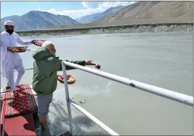  ?? ANI ?? Prime Minister Narendra Modi performs Sindhu Darshan Puja on his arrival at Nimu the forward brigade place, in Ladakh on Friday.