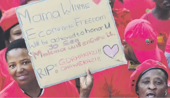  ?? Picture: Nigel Sibanda ?? SHOW OF FORCE. Economic Freedom Fighters members outside the Bloemfonte­in Magistrate’s Court yesterday after the case against EFF leader Julius Malema, in which he faces charges of inciting people to take unoccupied land, was postponed to July.