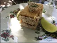  ?? JANET PODOLAK — THE NEWS-HERALD ?? Attention to detail, such as that shown in the creation of this sandwich served on antique china, is found at restaurant­s throughout France.