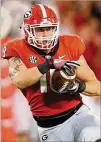  ?? CURTIS COMPTON / CCOMPTON@AJC.COM ?? “I think I had a better year overall than I did my freshman year,” says tight end Isaac Nauta.