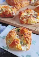  ?? GRETCHEN MCKAY/PITTSBURGH POST-GAZETTE ?? Turn your Easter leftovers into savory tarts filled with spinach, Swiss cheese and diced ham.