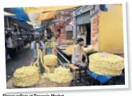  ??  ?? Flower sellers at Devaraja Market